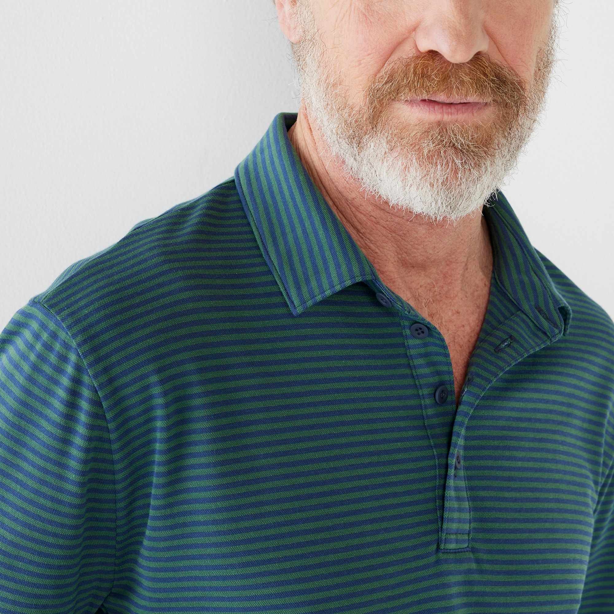 Performance polo shirt with COOLMAX&reg; in stripe
