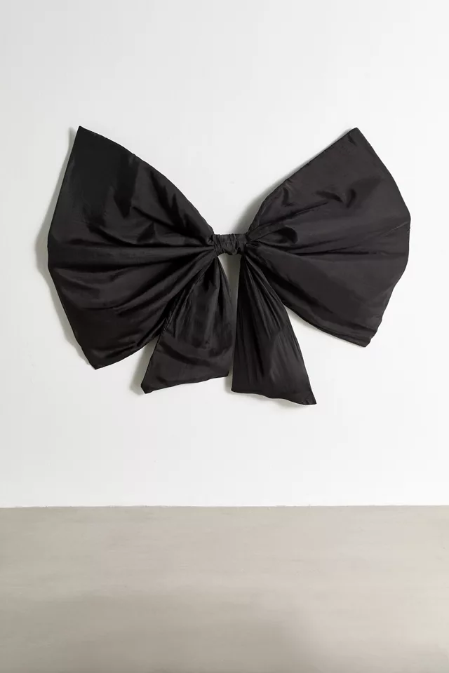 Bow Upholstered Floating Headboard